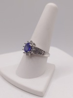  SIZE 9 14KT WHITE GOLD ~.70 CARAT TANZANITE WITH DIAMOND HALO AND ACCENTS RING