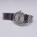 STAINLESS STEEL OMEGA DeVILLE PRESTIGE DATE SILVER DIAL WATCH