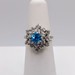 SZ 4.5 14kt White Gold ~.40ct Blue Topaz Center w/ ~.55tcw Diamond Cluster Ring