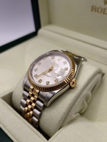 **Secondhand** 2005 or 2006 Rolex Datejust 36mm Silver Diamond Dial 