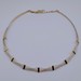  14KT TWO TONE GOLD MULTI-WIRE & BAR CROSSOVER CHOKER NECKLACE