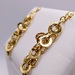  14KT YELLOW GOLD MULTI-RING LINK DANGLE EARRINGS