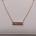  14KT YELLOW GOLD ~.20 TOT. CARAT WT. DIAMOND BAR PENDANT ON ROLO CHAIN NECKLACE