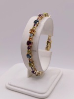  14KT YELLOW GOLD ~10 TOTAL GEM WT. MULTI-GEM 7.5" TENNIS STYLE BRACELET