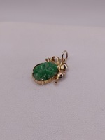  14KT YELLOW GOLD CARVED FLORAL MOTIF JADE 7/8" BOW PENDANT