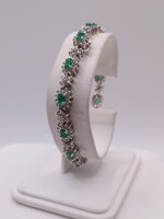  18KT WHITE GOLD ~3.4 TOTAL GEM WT. OVAL EMERALD AND ROUND DIAMOND LINK BRACELET