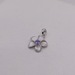  14KT WHITE GOLD ~.03 TOTAL CARAT WT. TANZANITE ACCENT PLUMERIA MOTIF PENDANT
