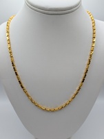  24KT YELLOW GOLD 24.5" ETCHED AND DIAMOND CUT BARREL STYLE LINK CHAIN