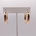  14KT YELLOW GOLD POLISHED FINISH OVAL HOLLOW TUBE 1.25" HOOP EARRINGS