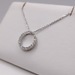  14KT WHITE GOLD ~.20 TOT. CARAT WT. DIAMOND CIRCLE PENDANT ON CHAIN NECKLACE