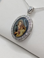  **CZ** 14KT WHITE GOLD 1 1/4" RELIGIOUS PENDANT WITH CZ HALO 