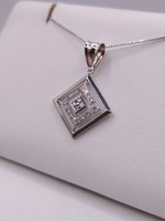  14KT WHITE GOLD ~.24 TOTAL CARAT WT. DIAMOND ACCENT OPEN 3-SQUARE PENDANT