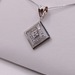  14KT WHITE GOLD ~.24 TOTAL CARAT WT. DIAMOND ACCENT OPEN 3-SQUARE PENDANT