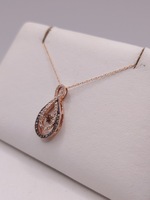  10KT ROSE GOLD ~.25 TOT. CARAT WT. DANCING DIAMOND 1" PENDANT ON CHAIN NECKLACE