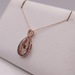  10KT ROSE GOLD ~.25 TOT. CARAT WT. DANCING DIAMOND 1" PENDANT ON CHAIN NECKLACE