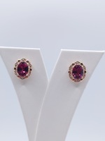  14KT ROSE GOLD ~2.5 TOT. CARAT WT. OVAL GARNET WITH DIAMONDS 1/2" STUD EARRINGS