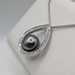  14KT WHITE GOLD BLACK PEARL AND DIAMOND PENDANT ON 18" WHEAT CHAIN NECKLACE