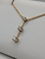  14KT YELLOW GOLD ~.50 TOTAL CARAT WT. THREE-DIAMOND 7/8" LINEAR DROP PENDANT