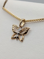  114KT TWO TONE GOLD ~.01 CARAT ROUND DIAMOND ACCENT 3/8" BUTTERFLY PENDANT