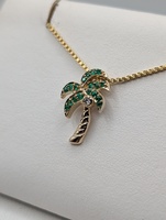  14KT YELLOW GOLD ~.23 TOTAL GEM WT. EMERALD AND DIAMOND 7/8" PALM TREE PENDANT