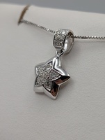  18KT WHITE GOLD ~.40 TOTAL CARAT WT. DIAMOND CLUSTER 7/8" STAR PENDANT