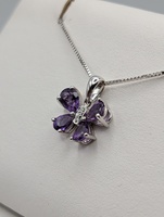  18KT WHITE GOLD ~.62 TOTAL GEM WT. AMETHYST AND DIAMOND 1/2" BUTTERFLY PENDANT