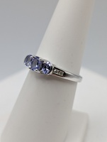  SZ 7 10KT WHITE GOLD ~.50 TOT. CARAT WT. 3-TANZANITE CENTER WITH DIAMONDS RING