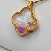  18KT YELLOW GOLD DANCING RUBY ACCENTED MOTHER OF PEARL 1" CLOVER PENDANT