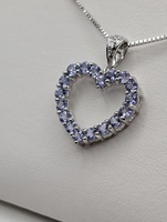  10KT WHITE GOLD ~1 TOTAL CARAT WT. TANZANITE 7/8" OUTLINE HEART PENDANT