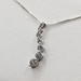  14KT WHITE GOLD ~.35 TOTAL CARAT WT. ROUND DIAMOND 3/4" JOURNEY PENDANT