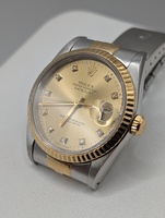 **Secondhand** 1991 Rolex Datejust 36mm Two Tone SS/18kt Diamond Champagne Dial 