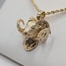  14KT YELLOW GOLD ~.16 TOTAL CARAT WT. DIAMOND ACCENT 1 1/8" RAM HEAD PENDANT