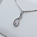  10KT WHITE GOLD ~.25 TOTAL CARAT WT. ROUND DIAMOND ACCENT 5/8" INFINITY PENDANT