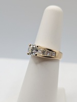  SIZE 5.5 18KT YELLOW GOLD ~.71 CARAT DIAMOND CENTER WITH BRIDGE ACCENT RING