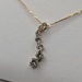  14KT YELLOW GOLD ~1 TOTAL CARAT WT. DIAMOND 7/8" ETERNITY DROP PENDANT